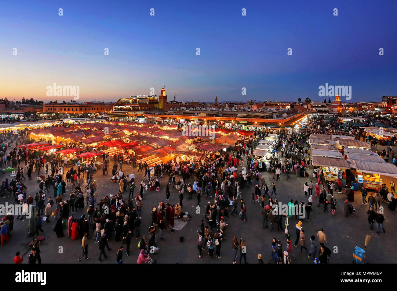 MARRAKECH, MOROCCO - 7 March 2016: Famous Jemaa el Fna square crowded at dusk. Marrakesh, Morocco Stock Photo