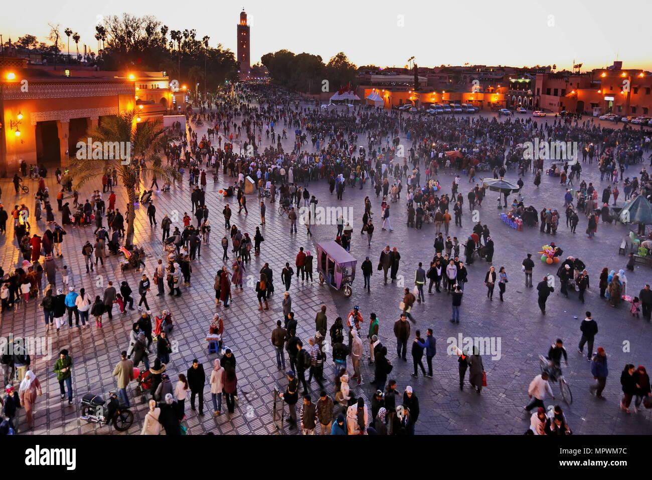 MARRAKECH, MOROCCO - 7 March 2016: Famous Jemaa el Fna square crowded at dusk. Marrakesh, Morocco Stock Photo