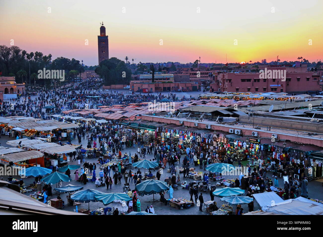 MARRAKECH, MOROCCO - 7 March 2016: Famous Jemaa el Fna square crowded at dusk. Marrakesh, Morocco Stock Photo