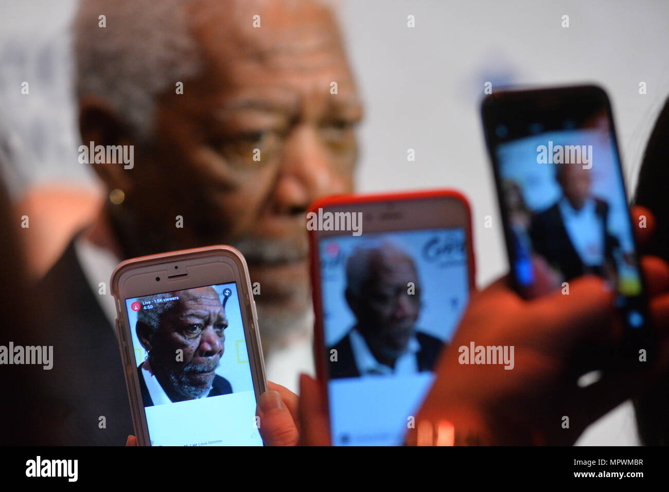 Morgan Freeman gets snapped by cameraphones while attending National Geographic 'The Story Of God' With Morgan Freeman World Premiere at Jazz at Linco Stock Photo