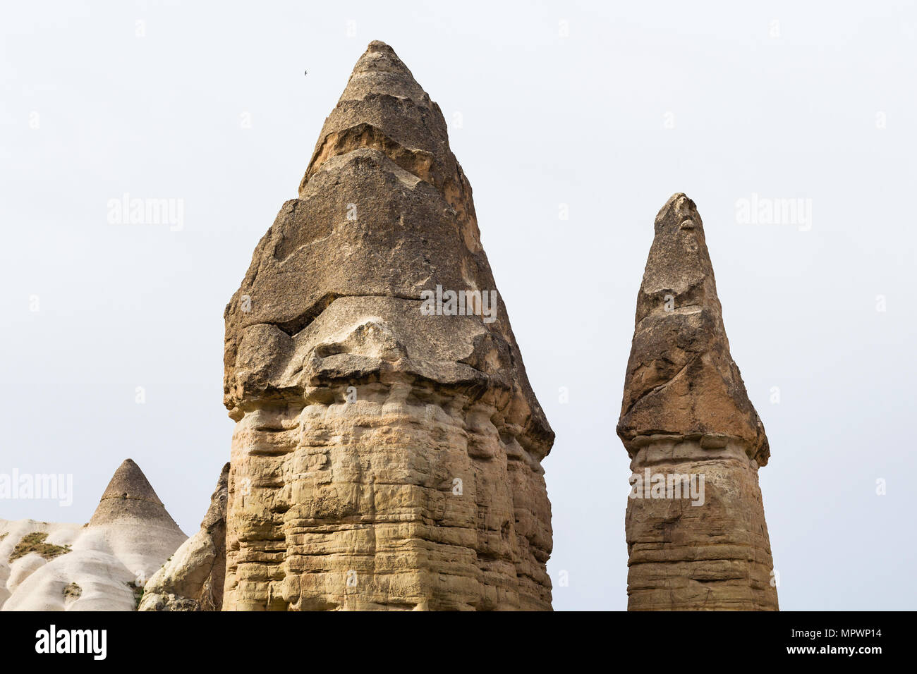 Cappadocia Rocks Travel to Turkey - few fairy chimney rocks in Goreme National Park in ...