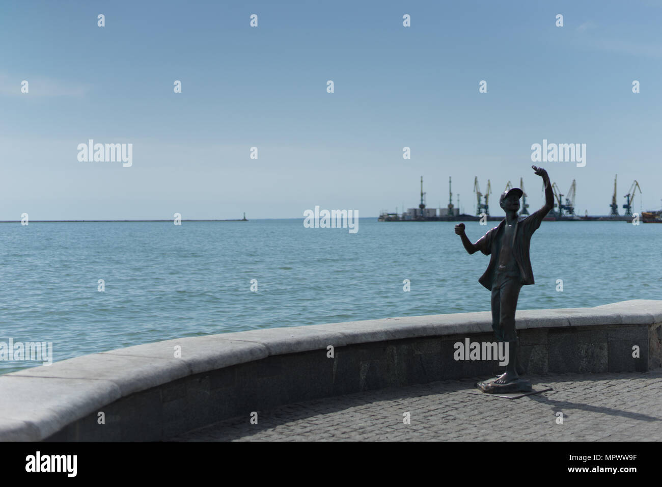 Monument boy-fisherman. Berdyansk. Ukraine Stock Photo