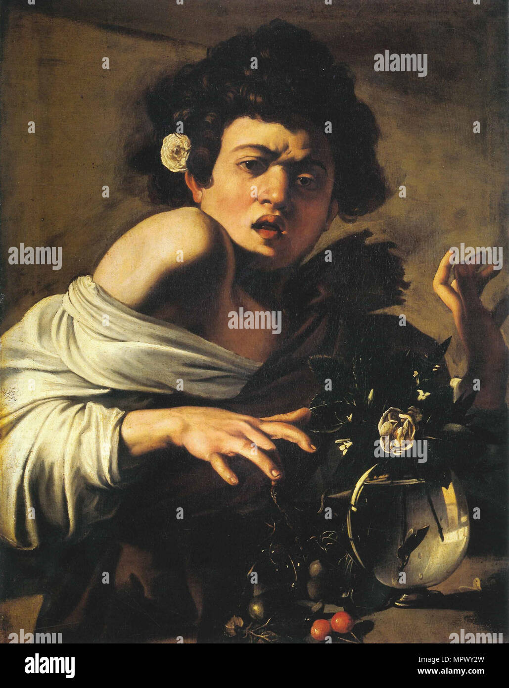 Caravaggio boy bitten by lizard hi-res stock photography and