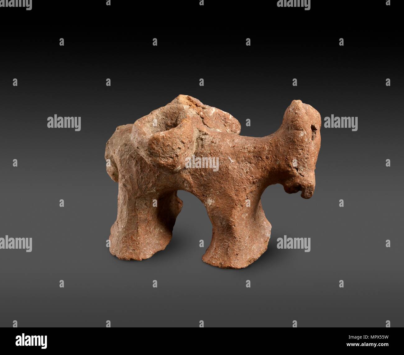 Red Polished / Matt-Polished donkey figurine with panniers, c20th century BC. Artist: Unknown. Stock Photo