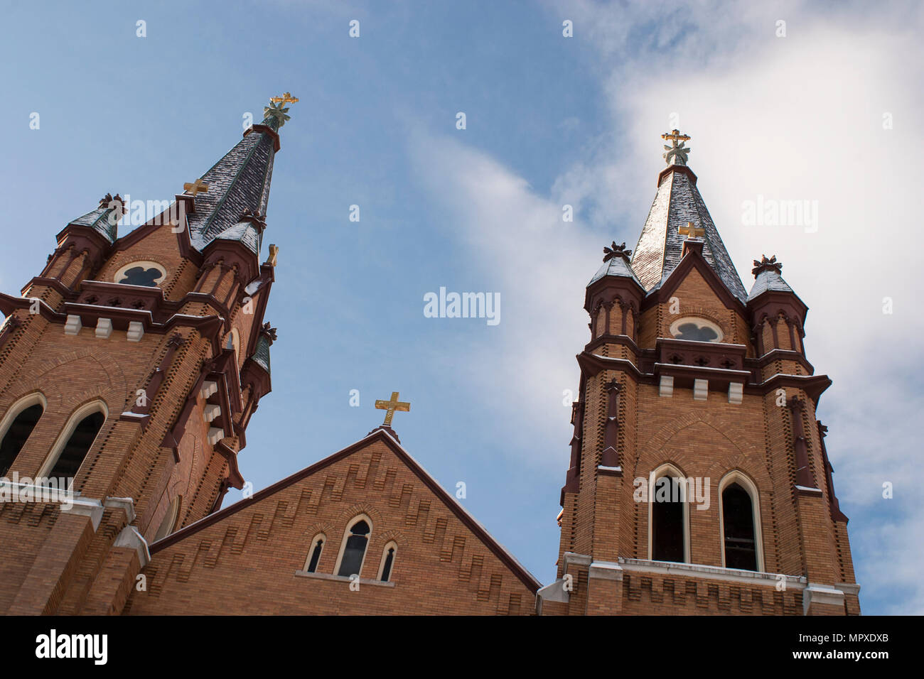 Winter view of roofline at St Stanislaus Kostka Church in Adams, MA