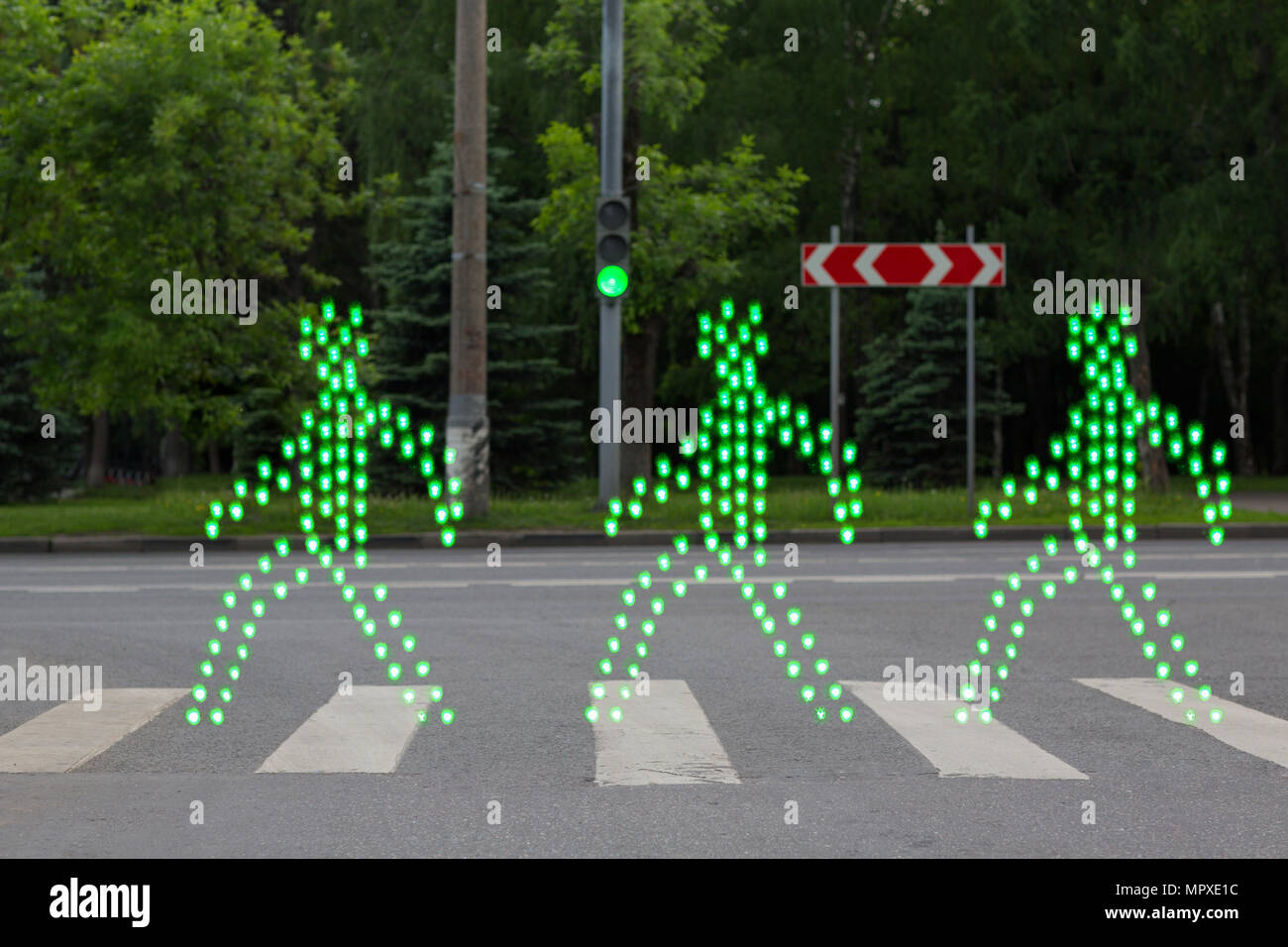Green people walking pedestrian crossing Stock Photo