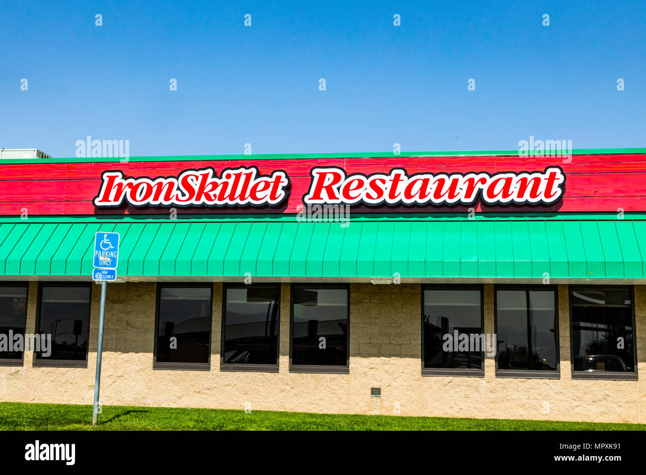 An Iron Skillet restaurant At Wheeler Ridge Tejon outlets along California's Interstate 5 Highway Stock Photo