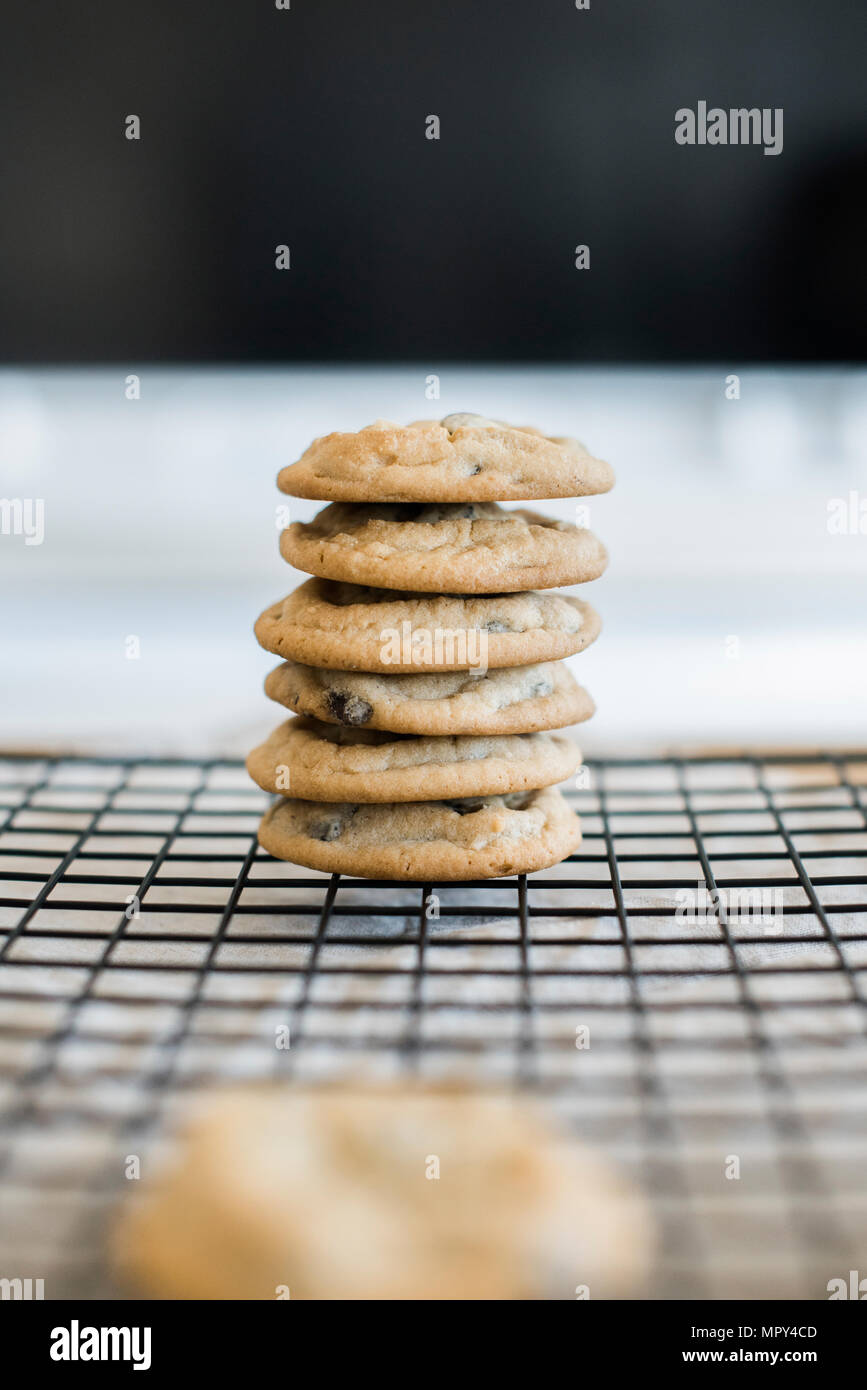Stack of cookies on cooling rack Stock Photo Alamy