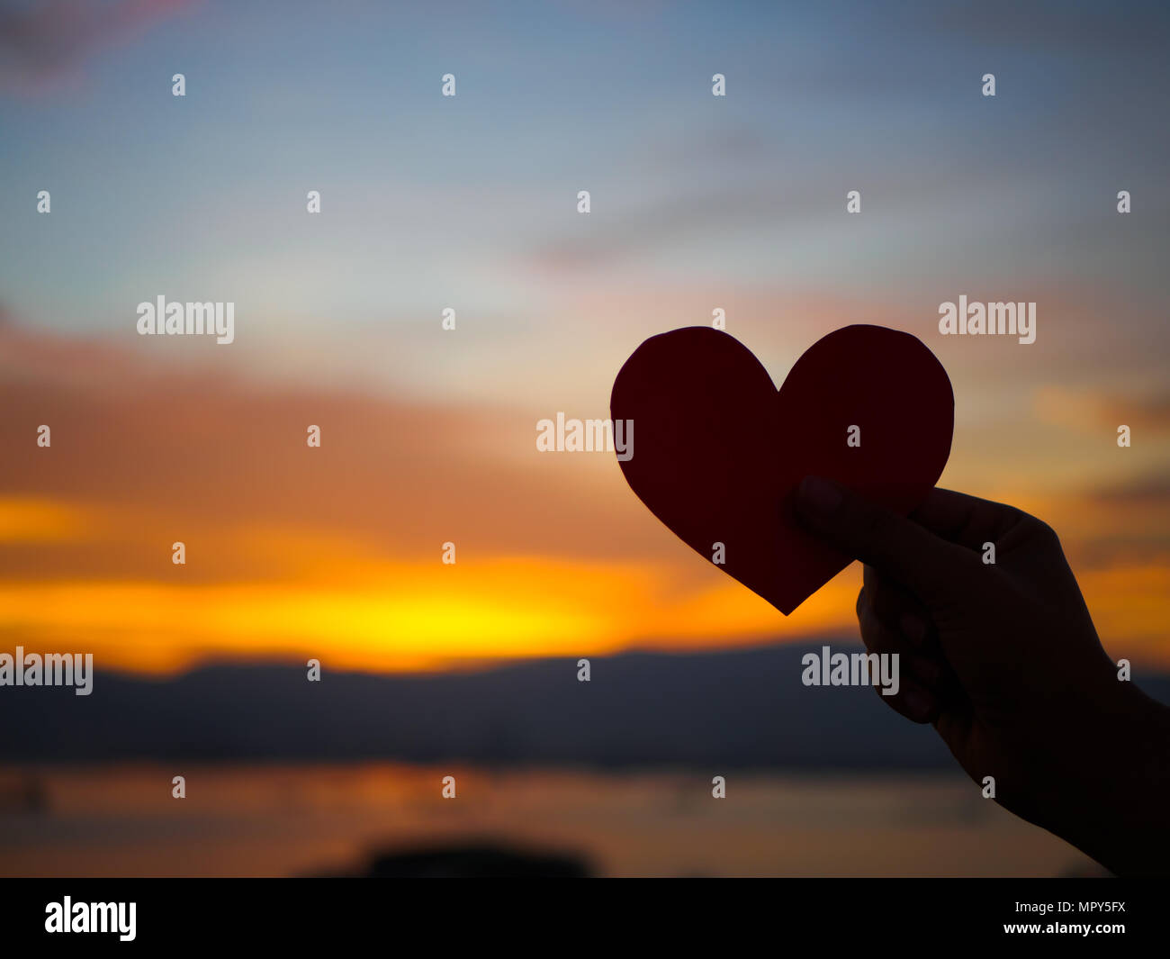 Boy and girl holding hands silhouette hi-res stock photography and ...