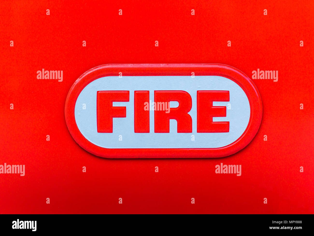 word fire on a red background close-up Stock Photo - Alamy
