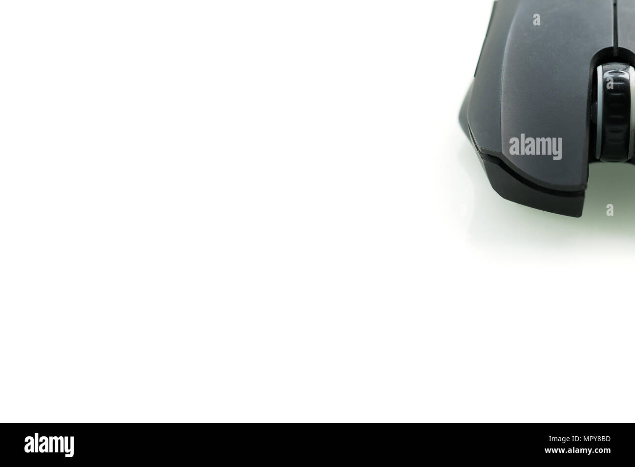 Wireless black computer mouse isolated on white background, closeup frontview Stock Photo