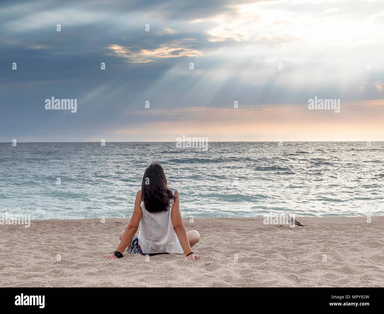 Mature woman rear view looking at sky hi-res stock photography and ...