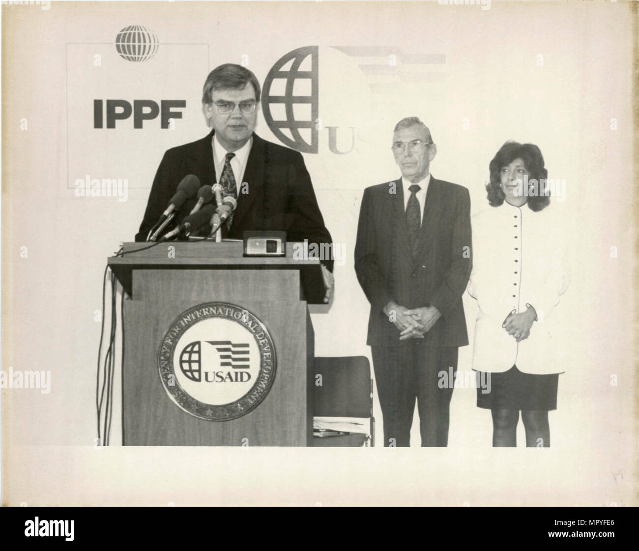 Admin. Atwood IPPF meeting - Man speaking at podium Stock Photo - Alamy