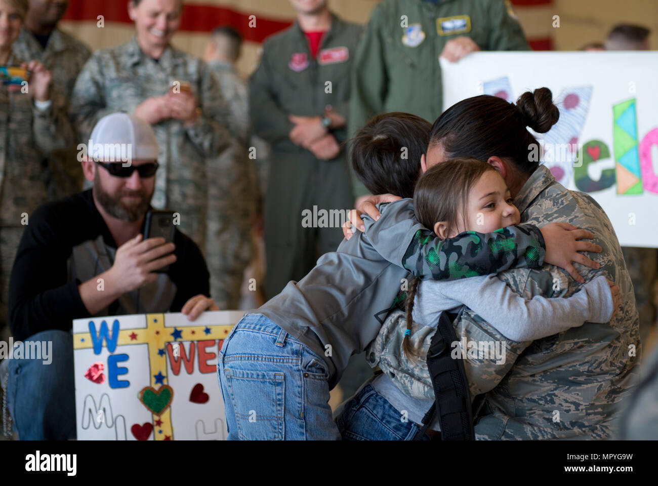 Friends and Families reunite at Hangar 25 on Joint Base Elmendorf-Richardson, Alaska April 21 as the 525th Fighter Squadron to return from a 7-month deployment. For many families, this was their first time being separated from their loved ones for an extended period of time. (U.S. Air Force photo by Senior Airman Kyle Johnson) Stock Photo