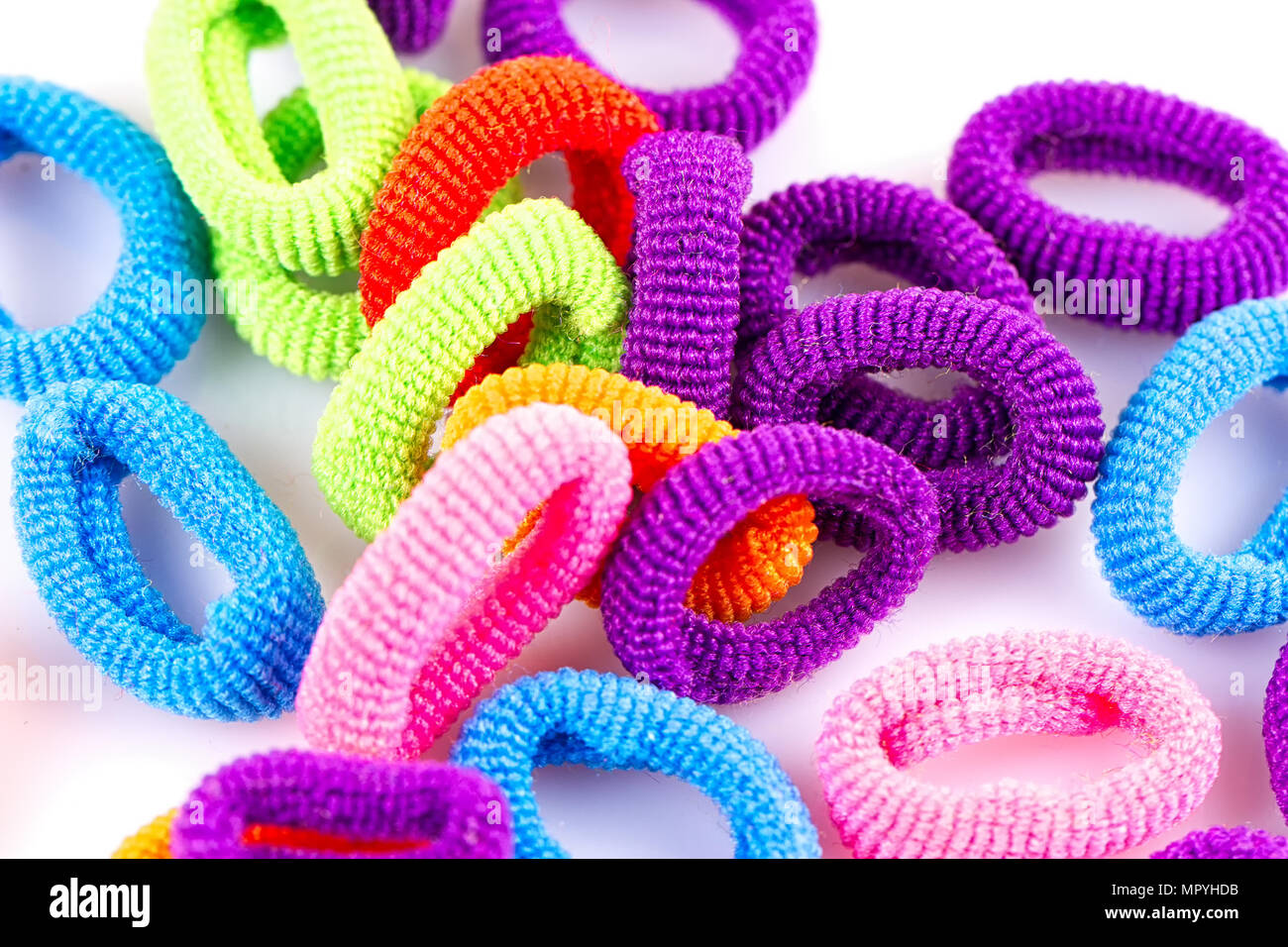 the hair multicolored rubber bands grouped close-up Stock Photo