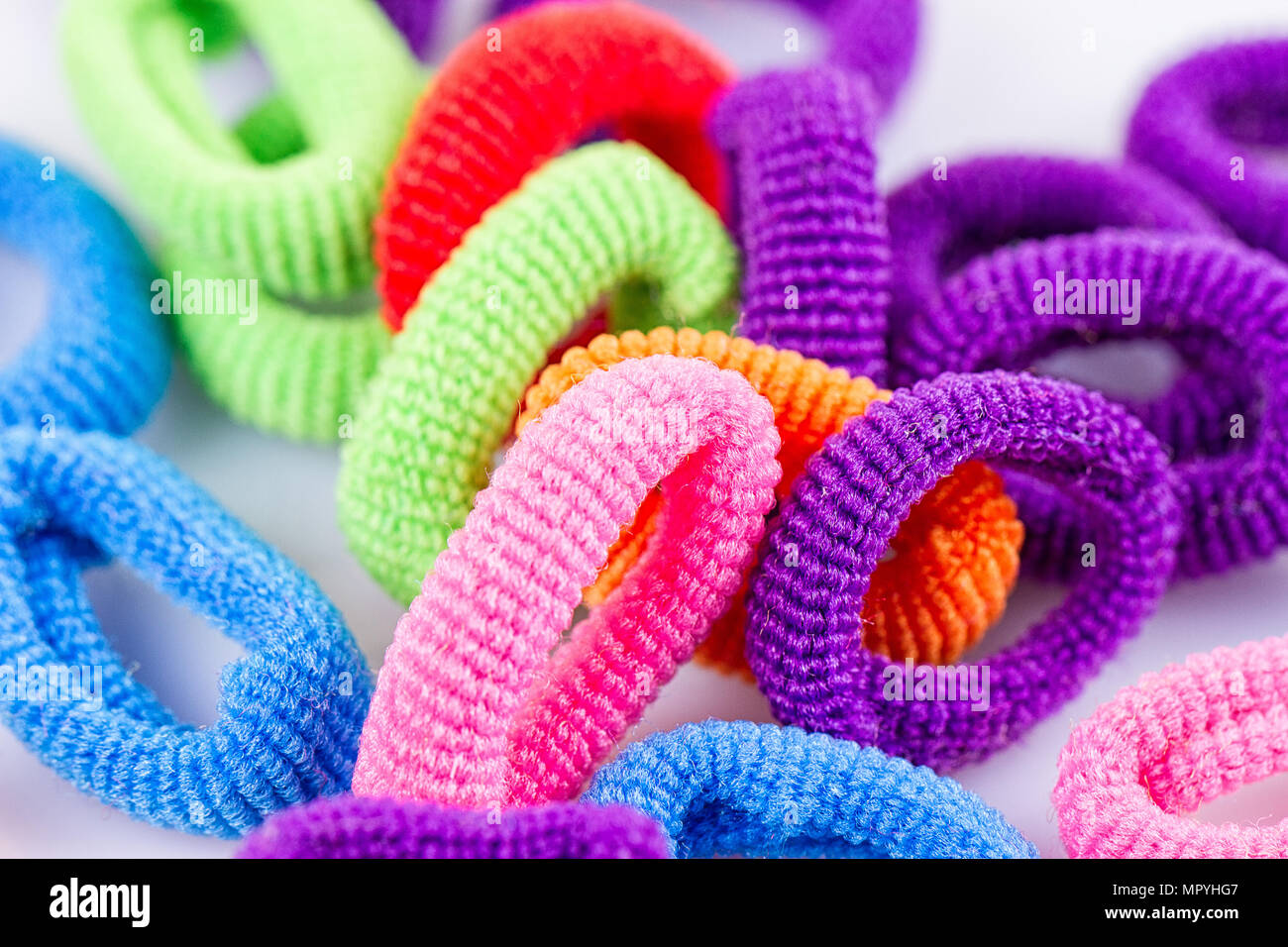 the hair multicolored rubber bands grouped close-up Stock Photo