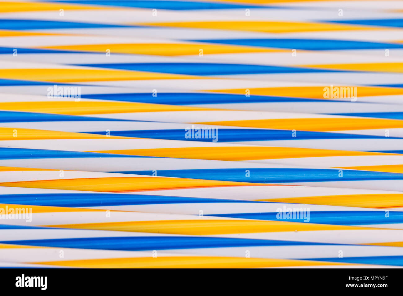 Background stripes multicolored smoothies plastic cocktail straws Stock Photo