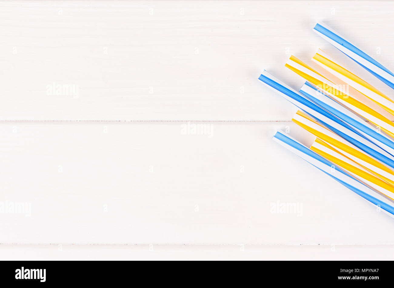 Multicolor cocktail tubes on white background. Close up Stock Photo