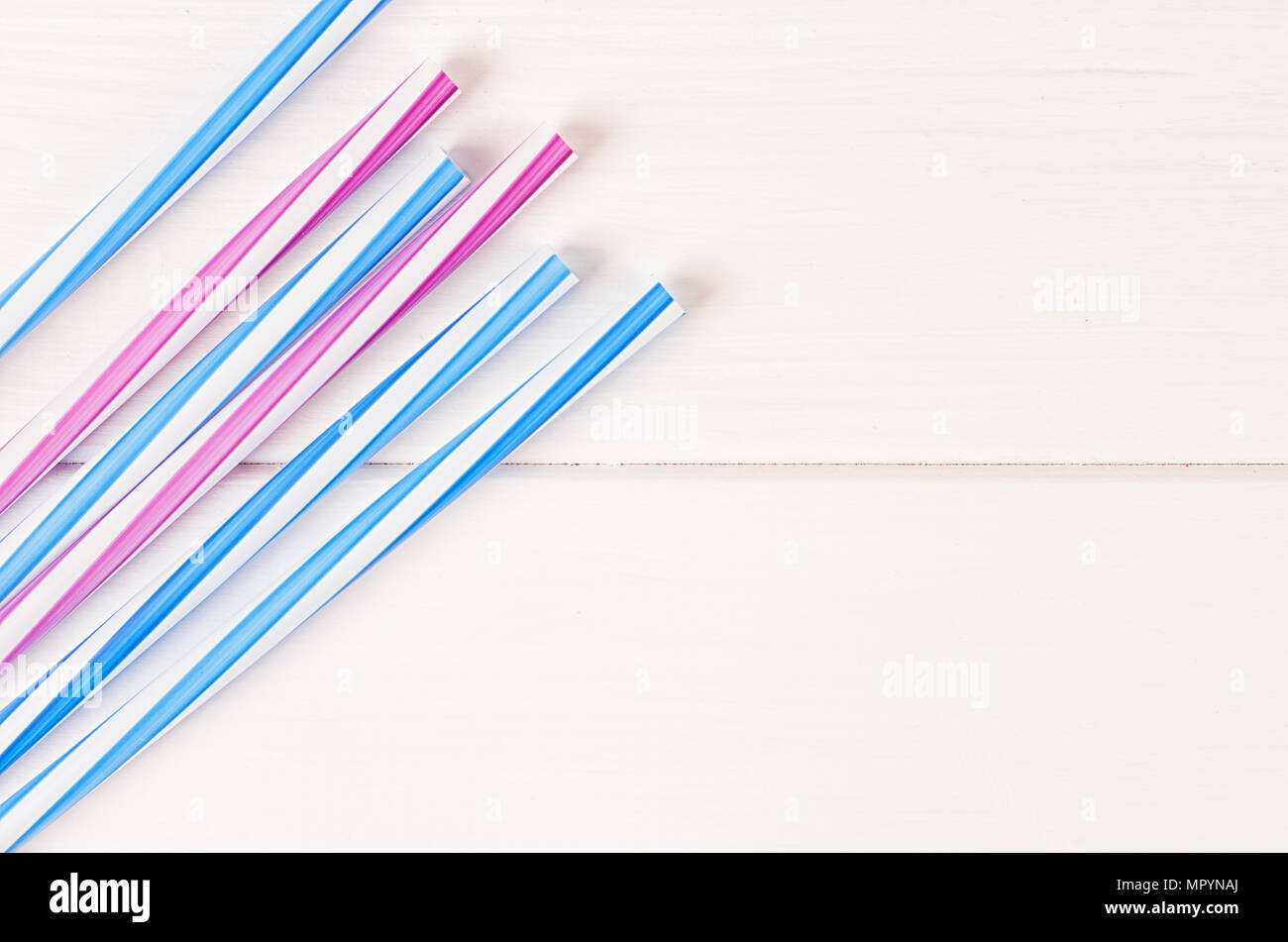 Multicolor cocktail tubes on white background. Close up Stock Photo