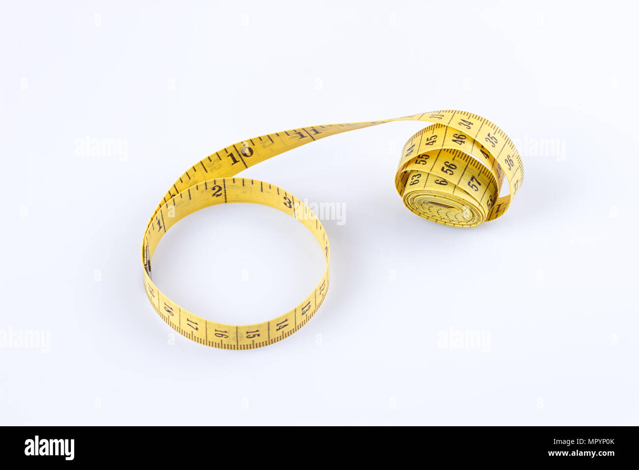 measure tape yellow isolated on white background Stock Photo