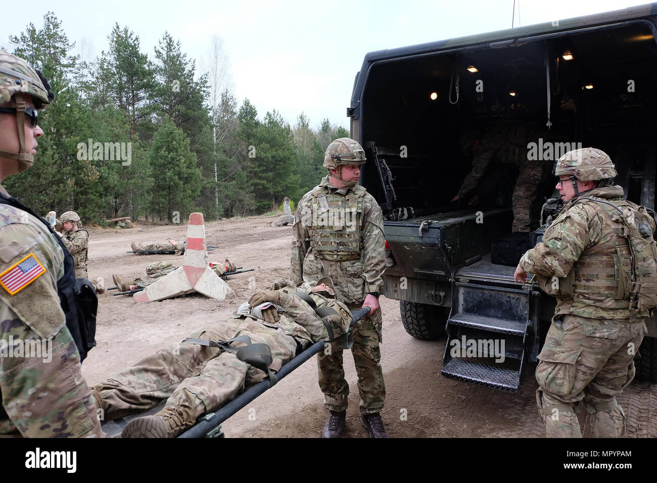 Battle Group Poland's Emergency Response Team Loads A Casualty For  Transport As Part Of Their Treatment And Evacuation Training Near Bemowo  Piskie April 21. The Skills Training Helps The Battle Group Medical
