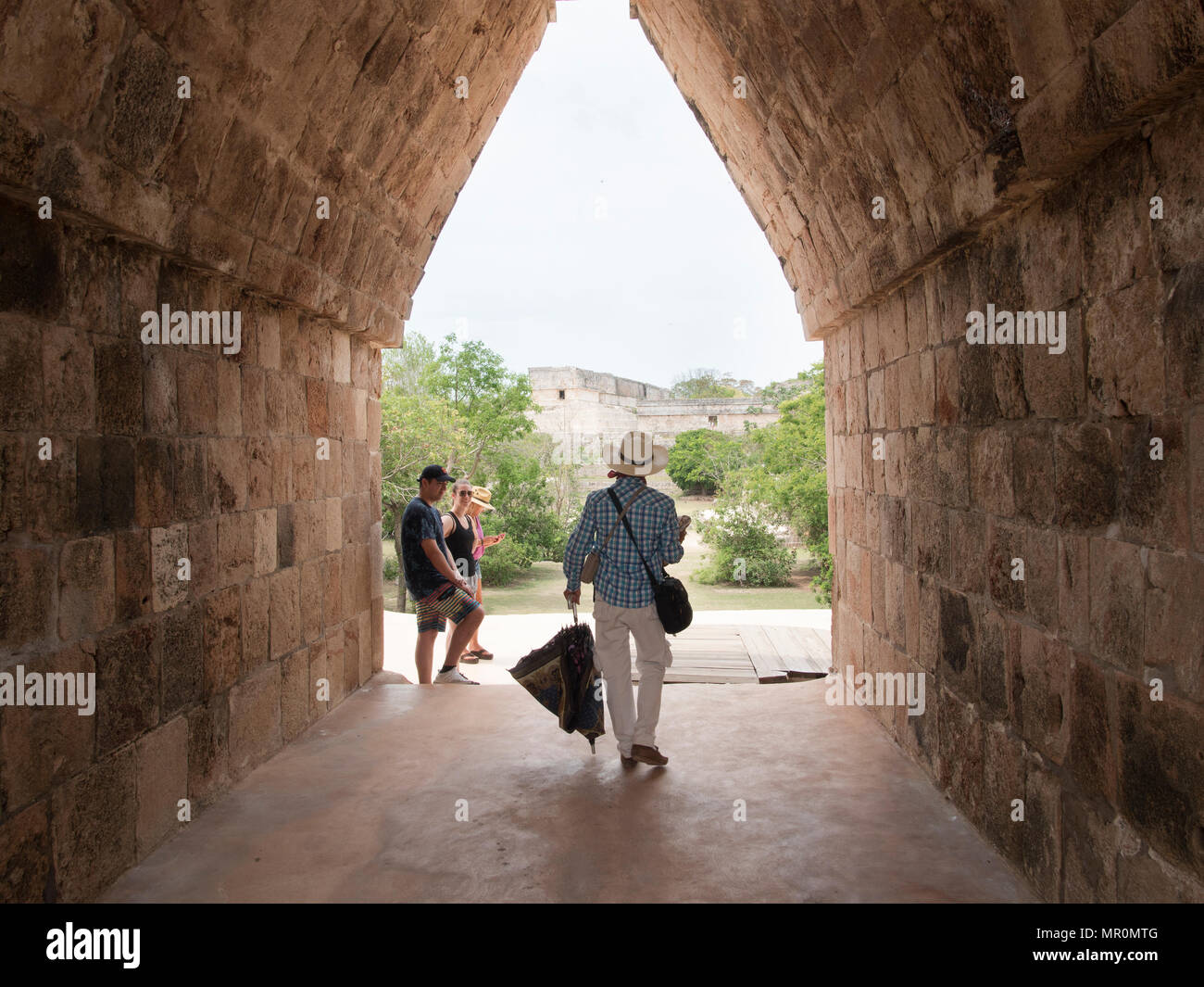 Visitors to Uxmal share a laugh Stock Photo