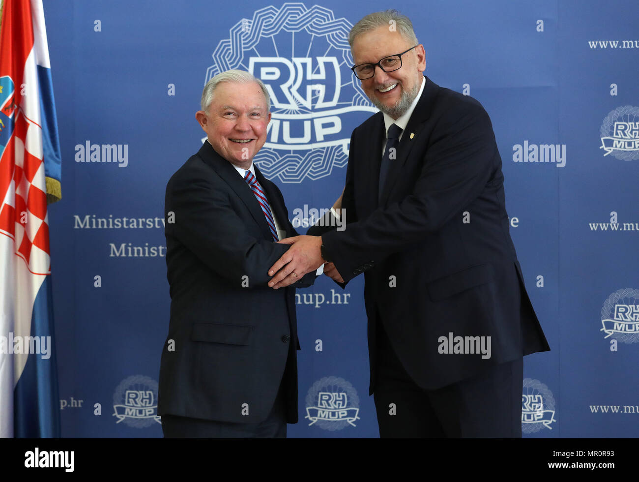 Zagreb, Croatia. 24th May, 2018. U.S. Attorney General Jeff Sessions (L) shakes hands with Croatian Interior Minister Davor Bozinovic during a press conference in Zagreb, capital of Croatia, on May 24, 2018. Sessions met with Croatian President Kolinda Grabar-Kitarovic and regional officials here on Thursday to discuss security issues, according to a president's office statement and Croatian news agency Hina reports. Credit: Robert Anic/Xinhua/Alamy Live News Stock Photo