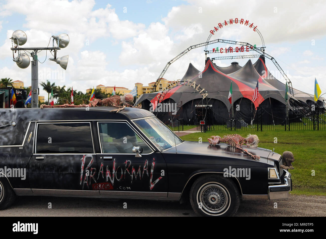 Palmetto, Florida, USA. 23rd May, 2018. A hearse adorned with skeletons is seen in front of the Paranormal Cirque circus tent during a media preview on May 23, 2018 in Palmetto, Florida. The new Paranormal Cirque, created by Manuel Rebecca, the president and owner of Cirque Italia, is in rehearsals for its first ever performance in Palmetto, Florida on June 7, 2018. The circus combines horror, stunts, illusions, theater, and cabaret, and is designed for an adult audience. (Paul Hennessy/Alamy) Credit: Paul Hennessy/Alamy Live News Stock Photo
