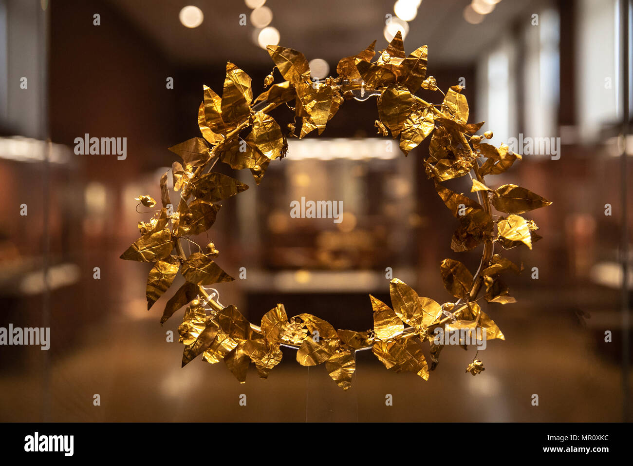 Athens. 23rd May, 2018. Picture taken on May 23, 2018 shows a gold leaf crown exhibited at the National Archaeological Museum in Athens, Greece. Located in the center of Athens, the National Archaeological Museum houses more than 20,000 exhibits, including the world's finest collection of Greek antiquities. Credit: Lefteris Partsalis/Xinhua/Alamy Live News Stock Photo