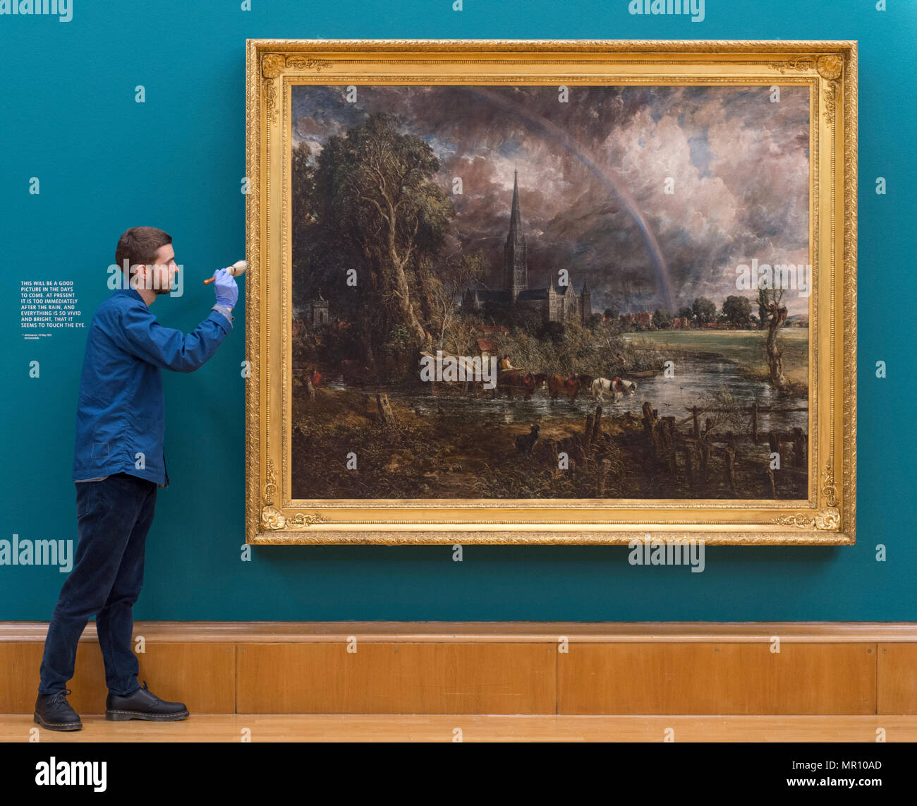 Tate Britain, London, UK. 25 May, 2018. Constable’s Salisbury Cathedral from the Meadows 1831 is shown alongside Turner’s Caligula’s Palace and Bridge, also 1831, in a new display, Fire and Water, marking the first pairing of these two works since they were exhibited over 180 years ago. Credit: Malcolm Park/Alamy Live News. Stock Photo