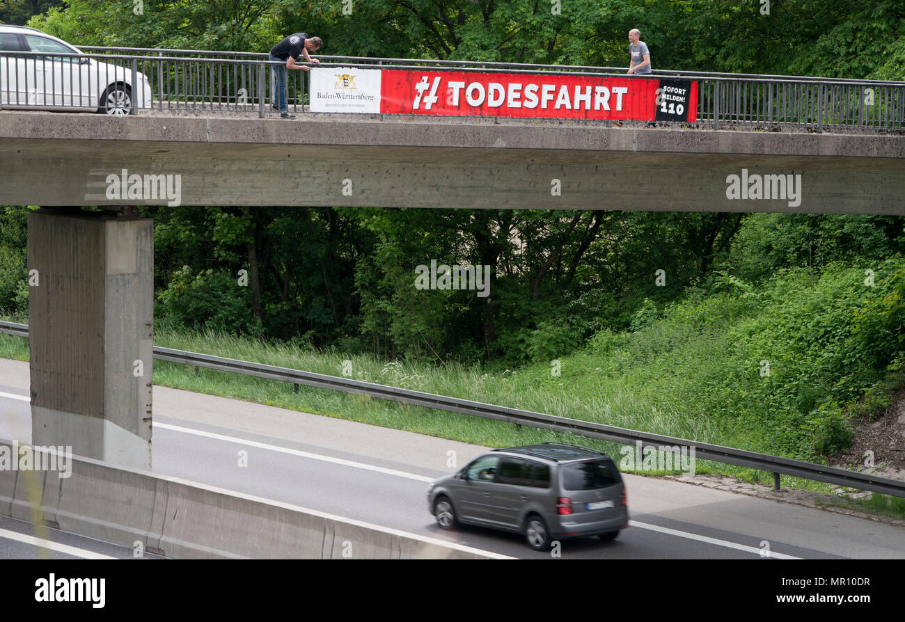24 May 2018: Germany, Geisingen: A banner, attached to the reiling of a bridge spanning across a motorway, reads 'Todesfahrt' (lit. fatal drive) as part of a campaign against illegal car races on German motorways. Photo: Steffen Schmidt/epa Scanpix Sweden/dpa Stock Photo