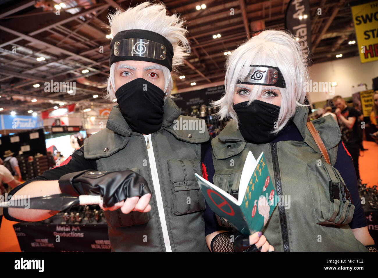 Participant dressed as characters from Naruto at the MCM Comic Con London festival at Excel in London, England Credit: Paul Brown/Alamy Live News Stock Photo