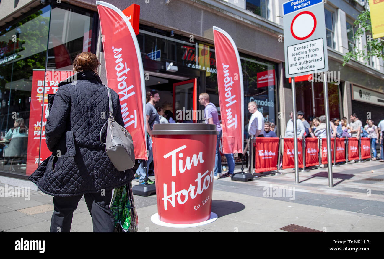 Fountain Street,Belfast, Northern Ireland.25th May 2018. Long queues formed when members of the public got in line to try the Coffee and Doughnuts at the newly opened Canadian Doughnut and Coffee chain Tim Hortons. It it its first restaurant in Northern Ireland Photo: Sean Harkin/Alamy Live News  Stock Photo