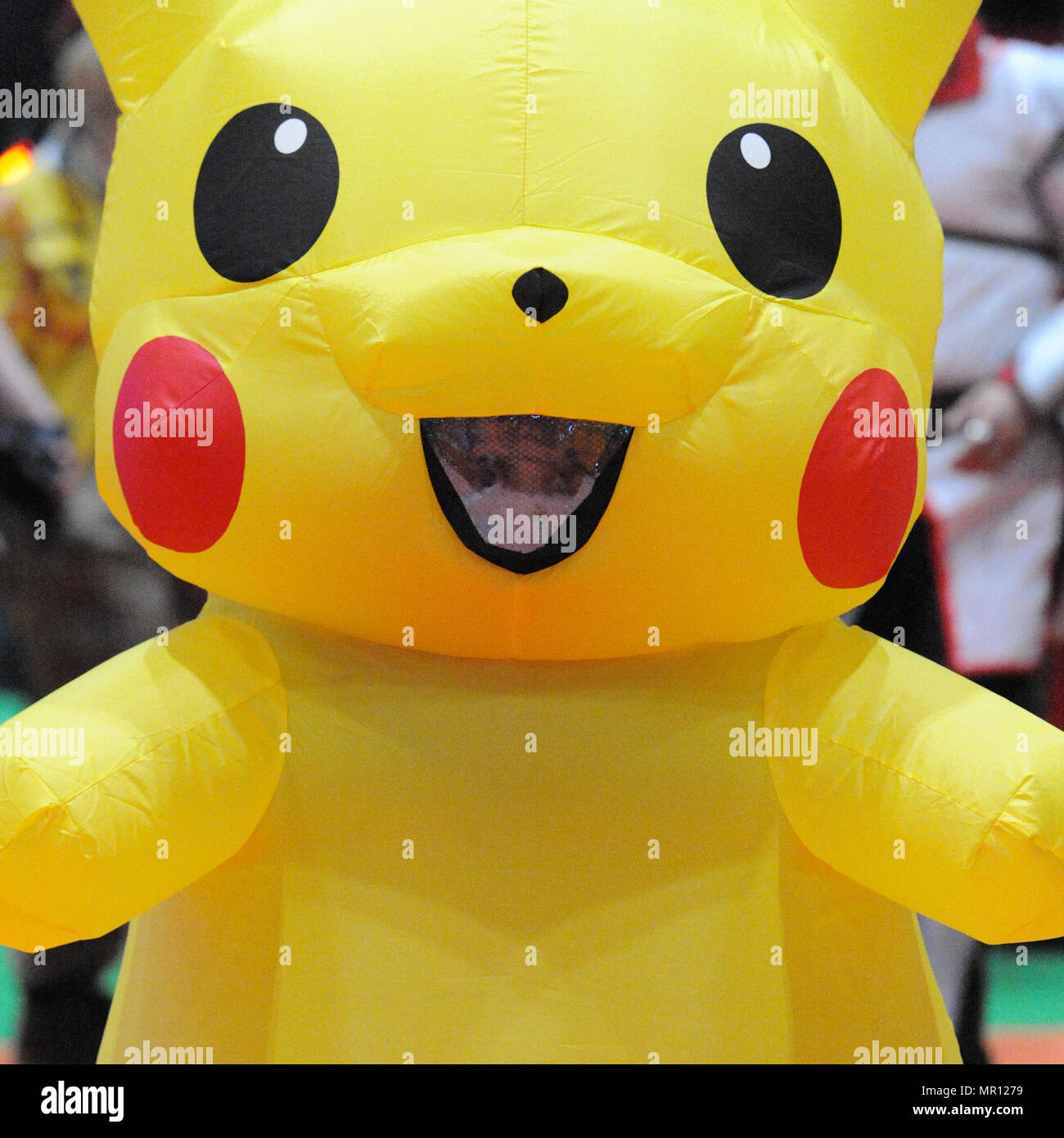 A Young Cosplay Enthusiast Dressed Up As The Japanese Pokemon Character Pikachu Japanese ピカチュウ At The Mcm London Comic Con Which Opened Today At The Excel Centre In East London Uk Tens