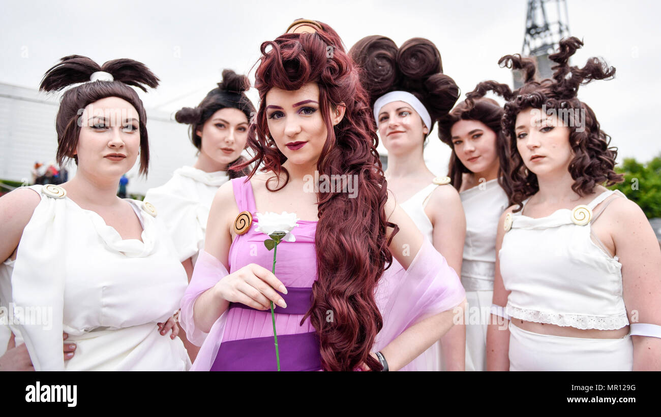 London, UK.  25 May 2018.  Cosplayers as Hercules' muses and Meg pose during MCM Comic Con at Excel in East London.   Thousands of fans of video games, comic books and other popular culture take the opportunity to dress up as their favourite characters as they attend the opening day of the three day festival.  Credit: Stephen Chung / Alamy Live News Stock Photo