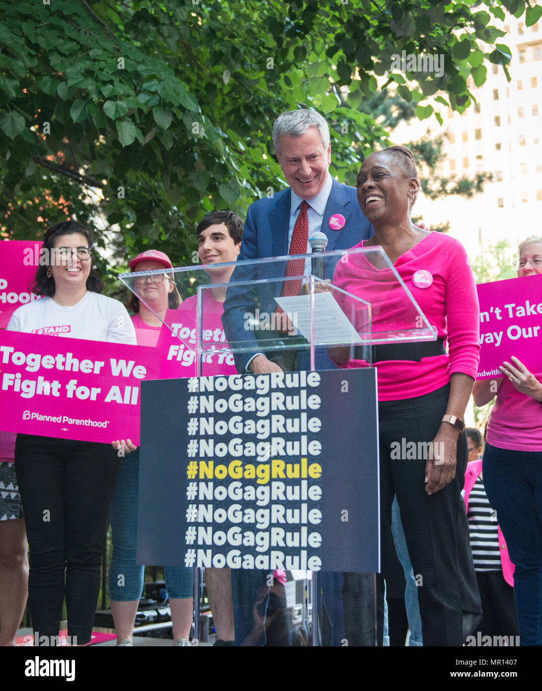 New York, USA. 24th May 2018. First Lady of New York City Chirlane McCray (with husband Mayor Bill DeBlasio in background) speaks at Title X (Title Ten) gag rule rally in New York City, hosted by Planned Parenthood of New York City on May 24th 2018, reacting the President Trump's attempt to ban Medicaid and federal funding to medical providers who provide full, legal medical information to patients wanting or needing abortion services. Credit: Brigette Supernova/Alamy Live News Stock Photo