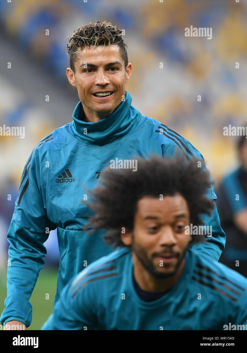 25 May 2018, Ukraine, Kiev: Football, FC Real Madrid training: Cristiano  Ronaldo and Marcelo (r) pictured during training at the Olimpiyskiy  National Sports Complex. Real Madrid and Liverpool FC are set to