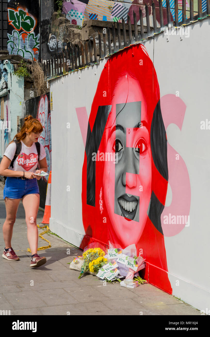 Dublin, Ireland. 25th May 2018. A young woman stands in silent thought at the memorial of Savita Halappanavar during the Irish Abortion Referendum 2018. Ireland are voting to repeal the 8th Amendment to the Irish Constitution. Credit: Butler Photographic/Alamy Live News Stock Photo