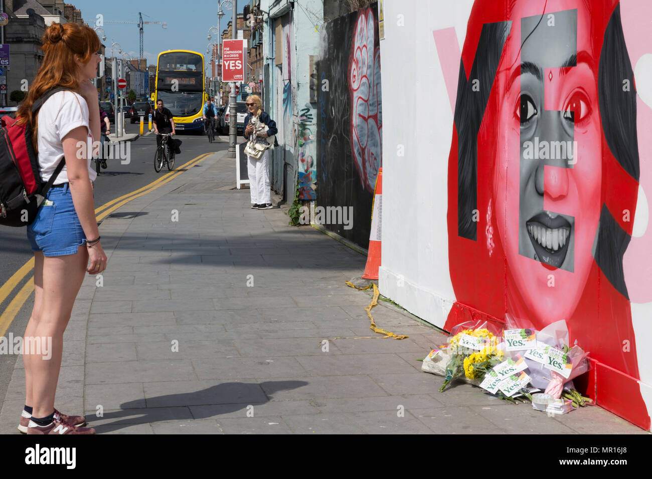 Dublin, Ireland. 25th May 2018. A young woman stands in silent thought at the memorial of Savita Halappanavar during the Irish Abortion Referendum 2018. Ireland are voting to repeal the 8th Amendment to the Irish Constitution. Credit: Butler Photographic/Alamy Live News Stock Photo