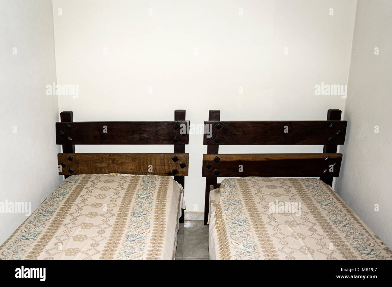 wooden bed white wall bedroom blanket rustic Stock Photo Alamy