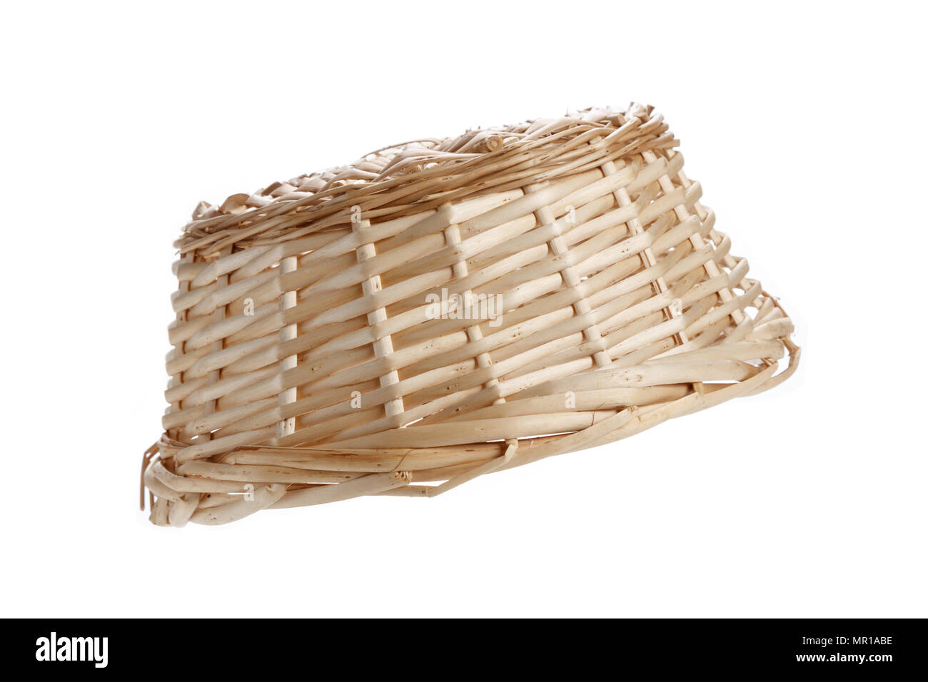 A wicker basket isolated on white background Stock Photo - Alamy
