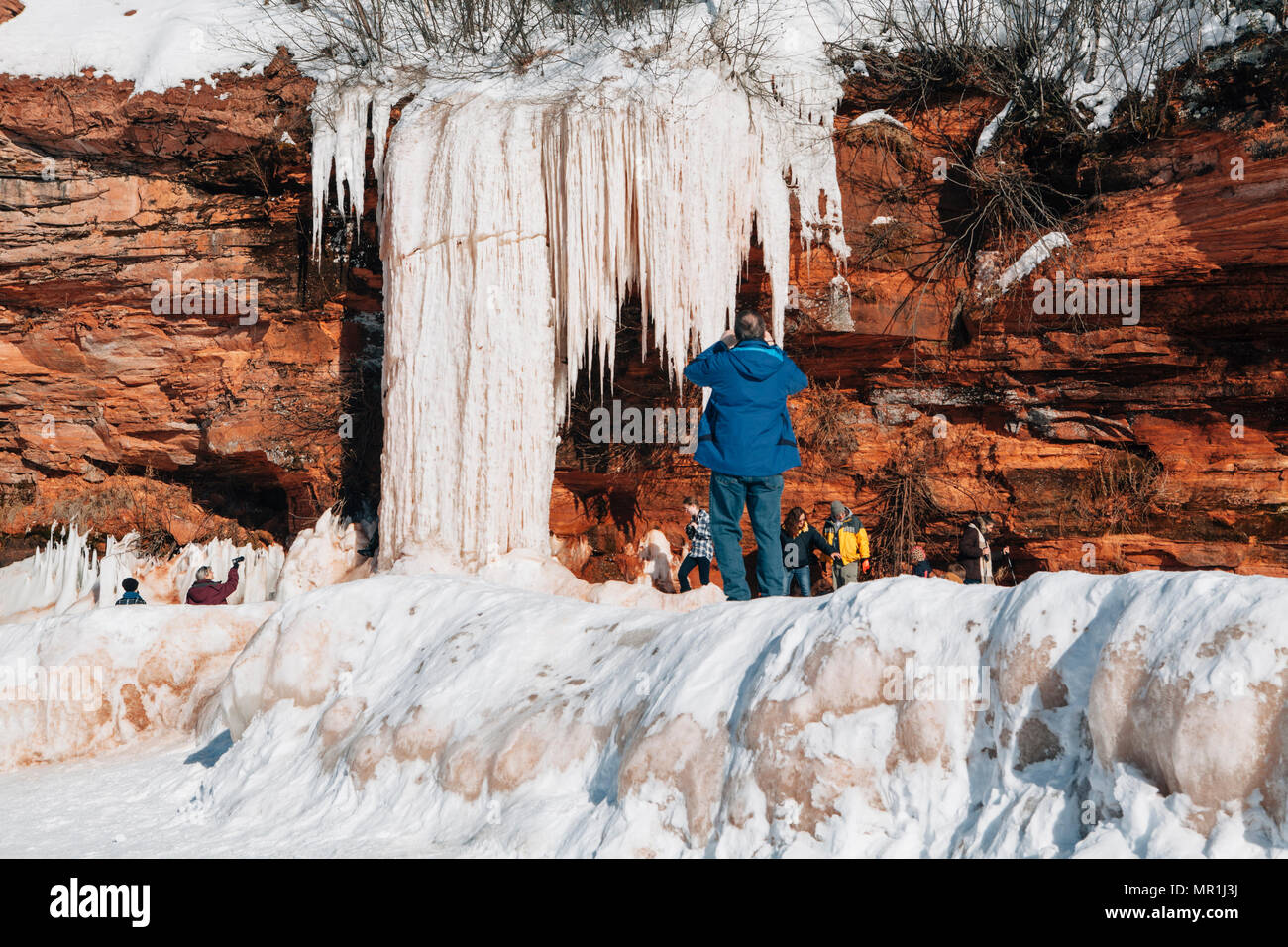 People visit the Apostle Islands National Lakeshore ice caves on a