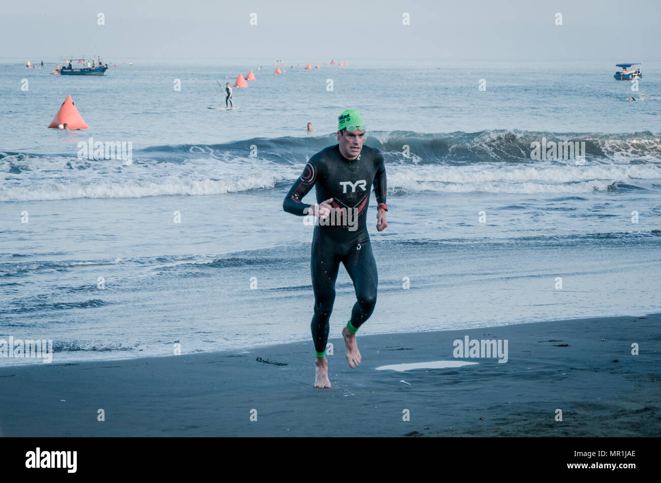 LIMA, PERU - APRIL 22th 2018: Ironman 70.3 . Starting for the swimming test of the athletes of the Ironman 70.3 Stock Photo