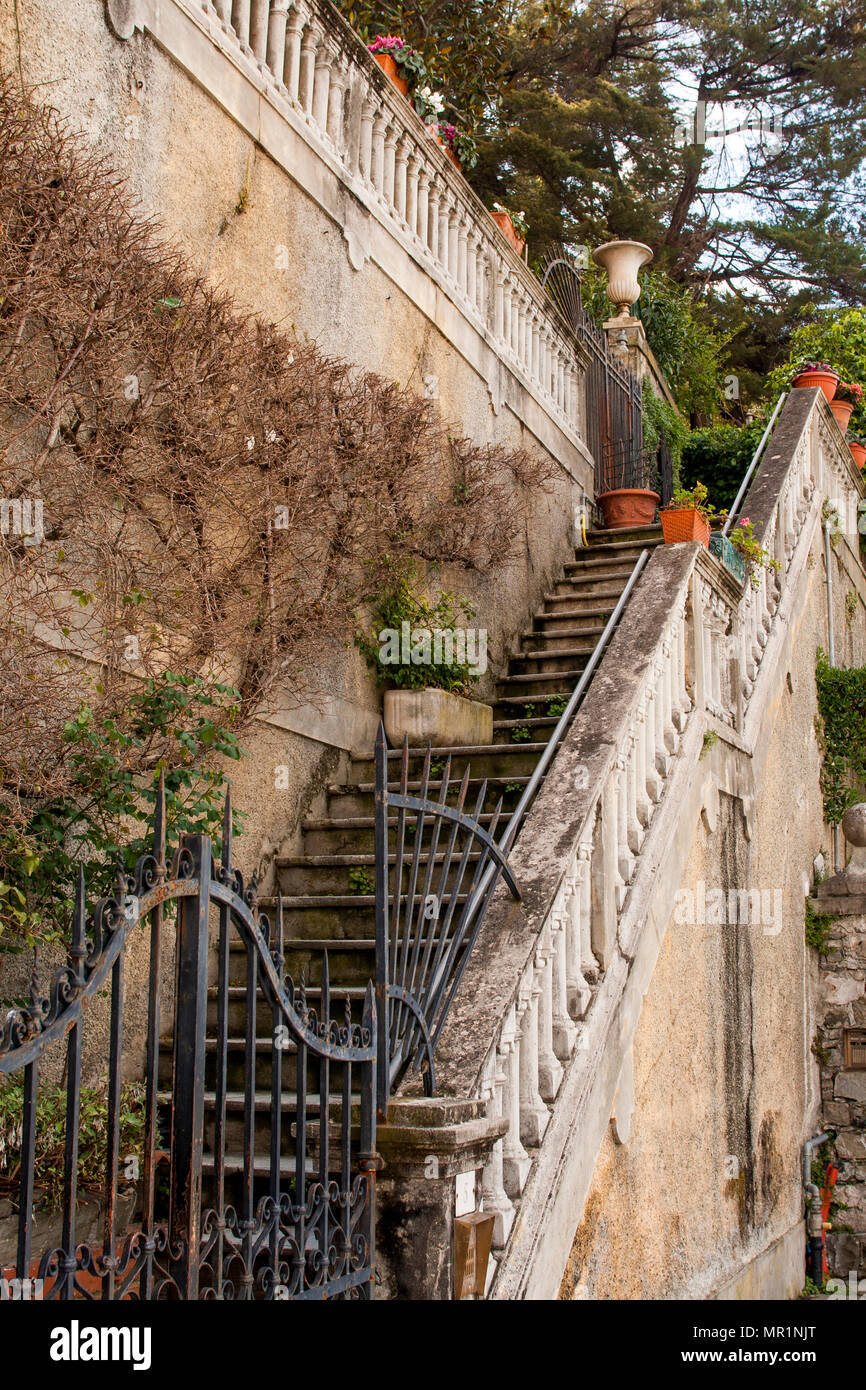 Beautiful outdoor staircase of old Italian villa Stock Photo