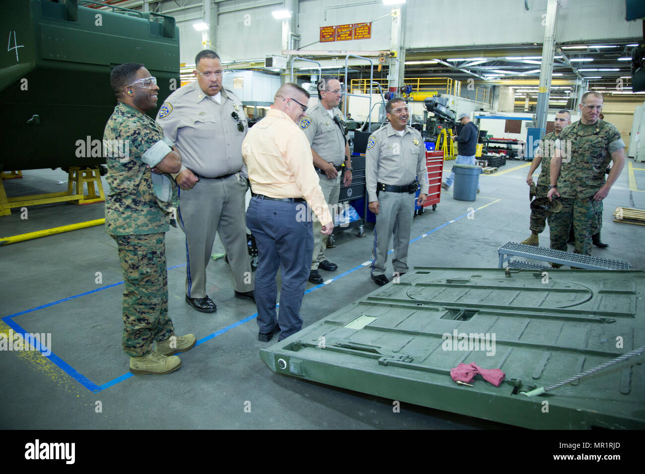 (Left) Colonel Sekou Karega, commanding officer, Marine Corps Logistics