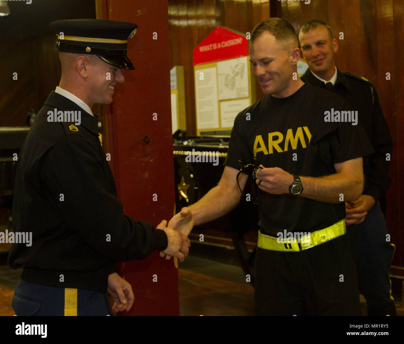 Capt. Austin Hatch, Caisson platoon leader, presents Staff Sgt. Steven ...