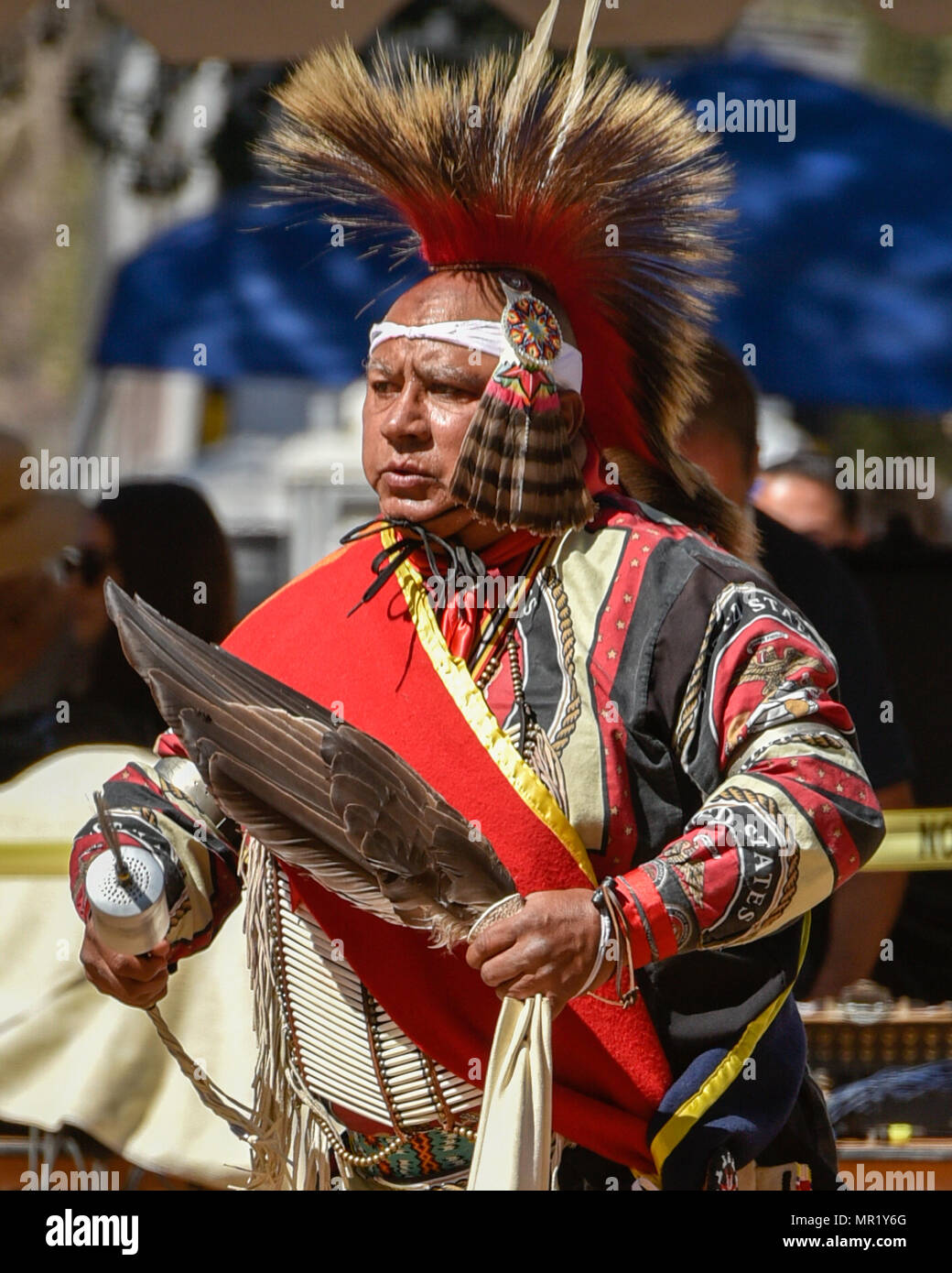 Adult native american elder with traditional regalia at the annual Chumash pow wow gathering in Live Oak camp California Stock Photo