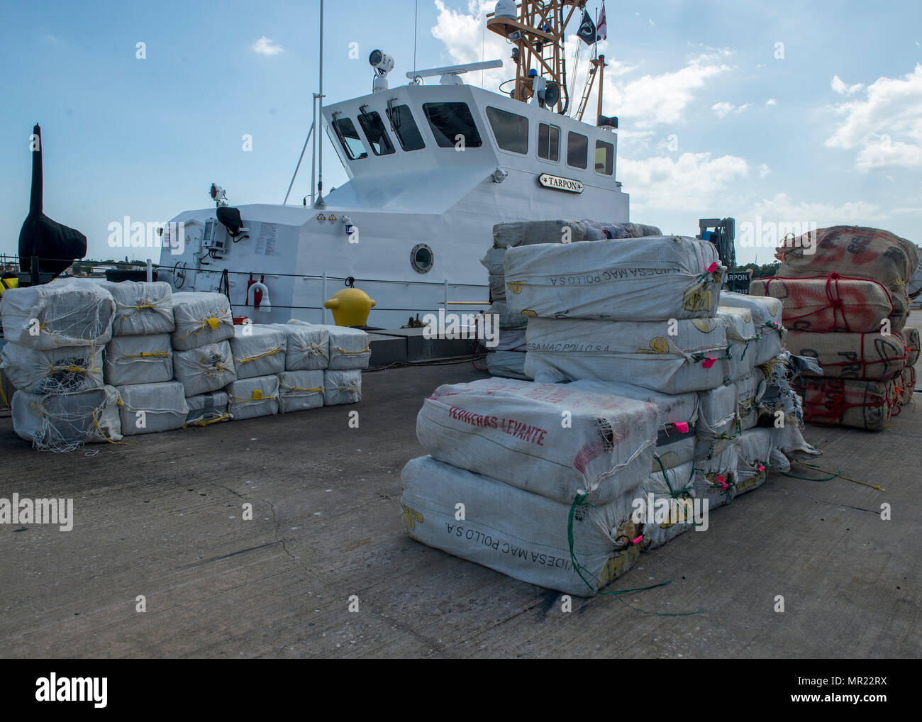 More than 3,825 pounds of cocaine await transfer to federal agents Wednesday, May 3, 2017 at Coast Guard Sector St. Petersburg, Florida. The contraband was interdicted during four separate cases supporting Operation Martillo, a joint interagency and multi-national collaborative effort among 14 Western Hemisphere and European nations to stop the flow of illicit cargo by Transnational Criminal Organizations. (U.S. Coast Guard photo by Petty Officer 1st Class Michael De Nyse) Stock Photo