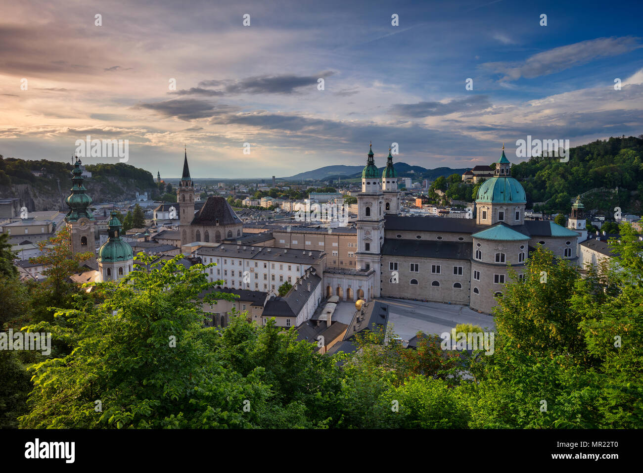 Salzburg, Austria. Cityscape image of the Salzburg, Austria with Salzburg Cathedral during spring sunset. Stock Photo