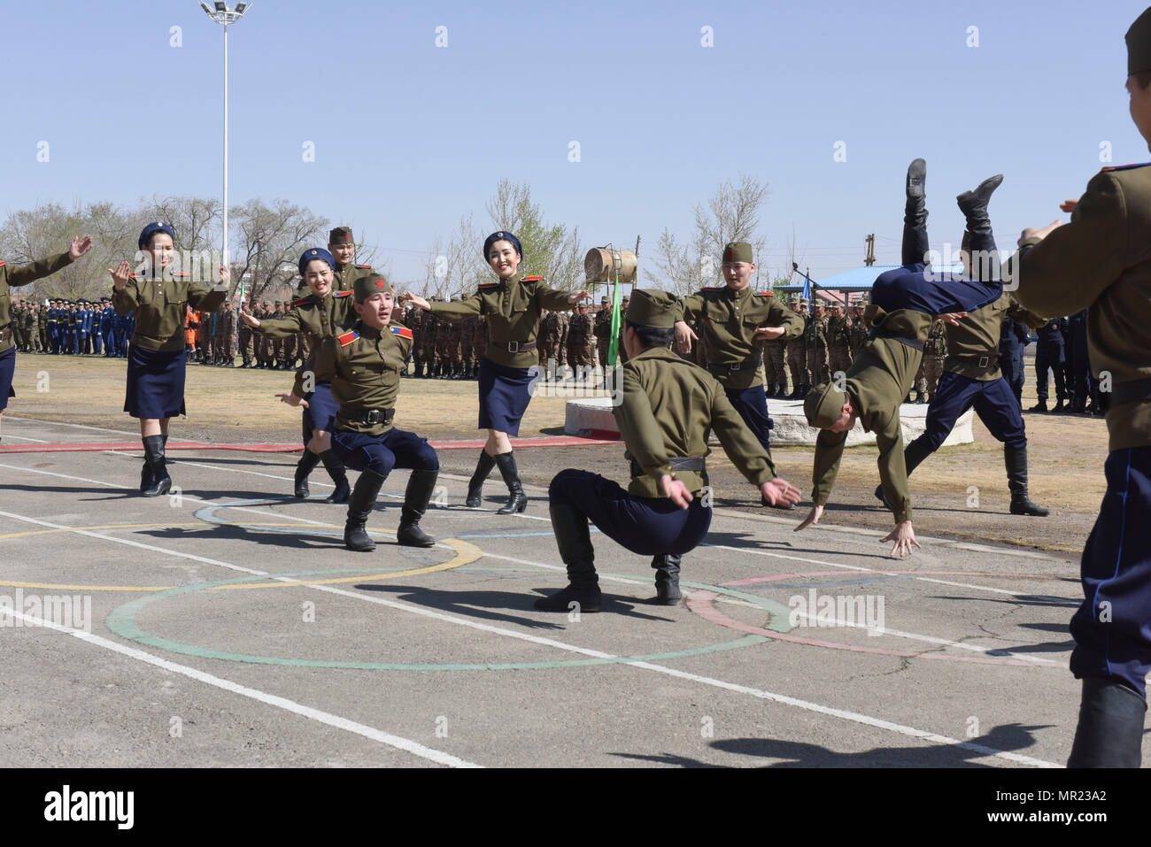 Members of the Mongolian Military Dance and Song Ensemble perform during the opening ceremony for exercise Gobi Wolf 2017 held in Dalanzadgad, Mongolia, May 1, 2017. GW 17 is hosted by the Mongolia National Emergency Management Agency and Mongolian Armed Forces as part of the United States Army Pacific’s humanitarian assistance and disaster relief “Pacific Resilience” series. (U.S. Air Force photo by Maj. John Romspert) Stock Photo